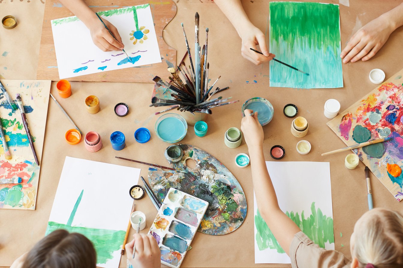 Children Painting at the Table